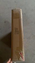 Packaging of X-ZONE PET Outdoor Cat House Catio, brown cardboard box with shipping label visible.