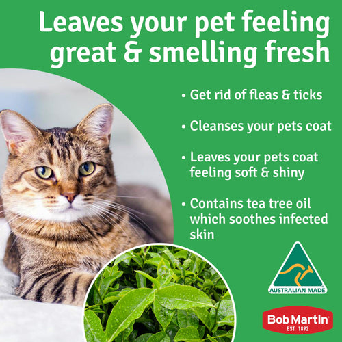 Cat enjoying a fresh coat from Bob Martin, featuring benefits like flea removal and soothing tea tree oil.